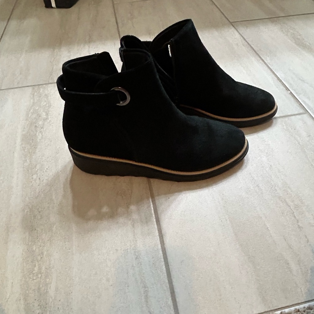 Suede booties by Clarks